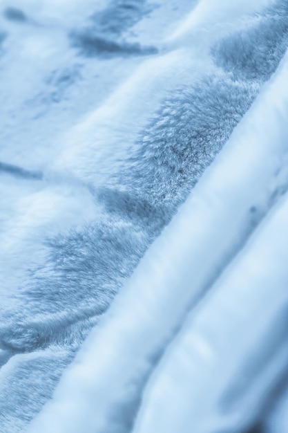 Foto detalle de tela artificial de fondo de textura de abrigo de piel azul de lujo