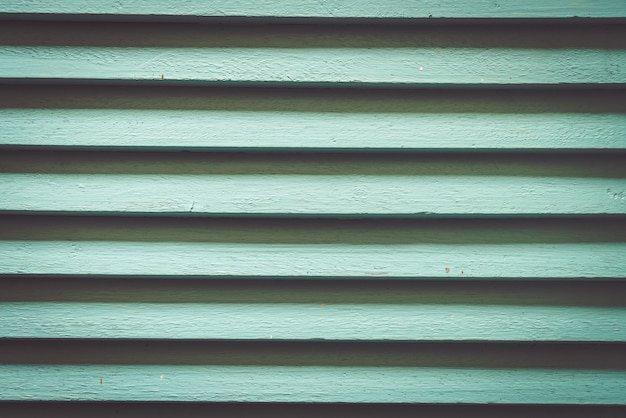 detalle y textura de ventana de madera verde