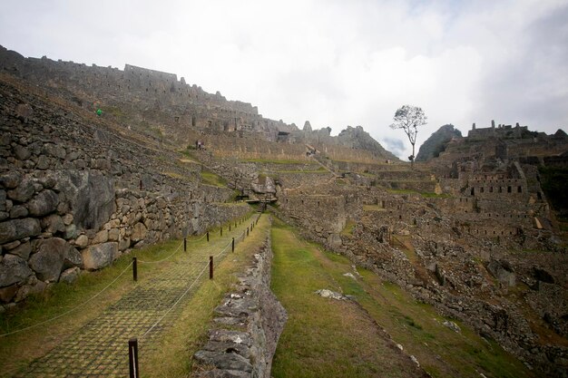 Detalles de la antigua ciudadela inca de la ciudad de Machu Picchu en el Valle Sagrado del Perú.