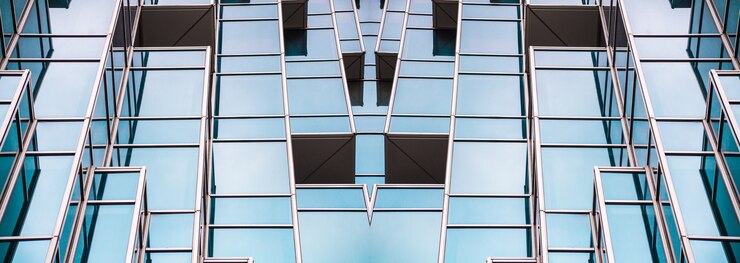 Detalles de la arquitectura Edificio moderno Fachada de vidrio Antecedentes comerciales