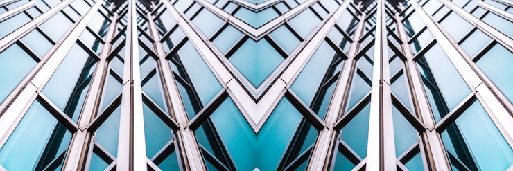 Detalles de la arquitectura Edificio moderno Fachada de vidrio Antecedentes comerciales