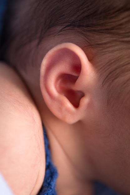 Detalles del bebé recién nacido fotografía macro dedos de los pies cabeza labios orejas