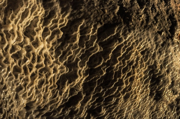 Detalles de texturas generadas por agua en las rocas de las cuevas de Jenolan, Australia