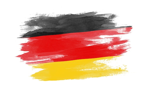 Foto deutschland flagge pinselstrich, nationalflagge auf weißem hintergrund