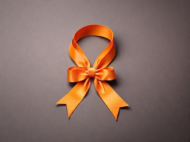 Día Mundial de Concientización sobre el Cáncer Cinta naranja sobre fondo naranja