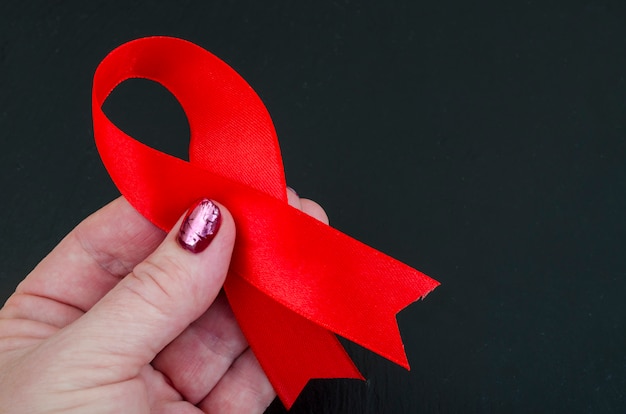 Dia Mundial da Aids com fita vermelha