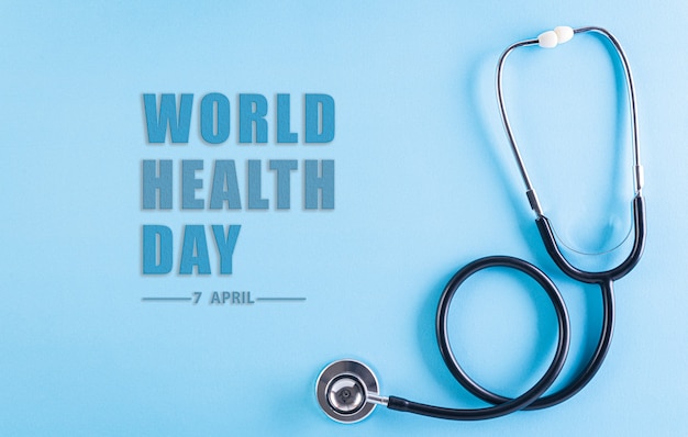 Dia Mundial da Saúde. Estetoscópio em azul pastel com o texto.