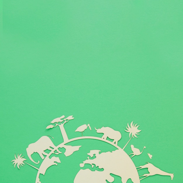 Foto día mundial del medio ambiente objeto de madera sobre fondo verde con espacio de copia