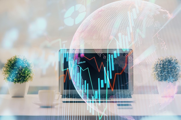 Diagrama financiero y tabla con computadora en el fondo Exposición múltiple Concepto de mercados internacionales