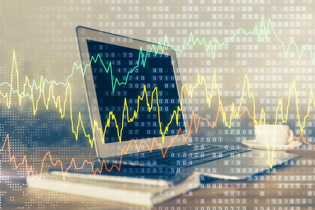 Diagrama financiero y tabla con computadora en el fondo Exposición múltiple Concepto de mercados internacionales