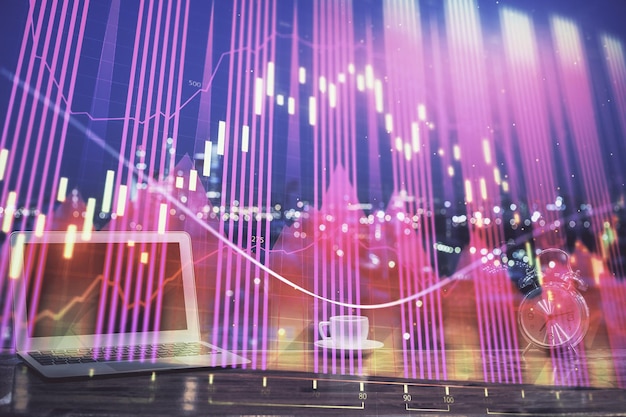 Diagrama financiero y tabla con computadora en el fondo Exposición múltiple Concepto de mercados internacionales