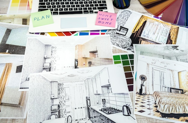 Foto dibujo de hogar moderno con material de muestra en escritorio creativo, en la oficina. concepto de decoración o reparación de la casa