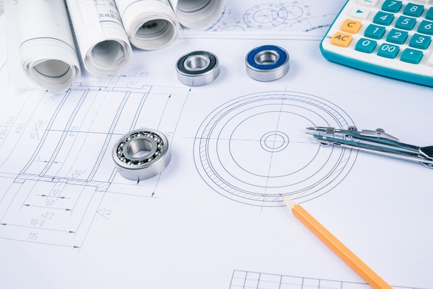 Los dibujos de construcción deslizan los cojinetes de rodillos de la pinza en la arquitectura del modelo y el concepto de construcción.