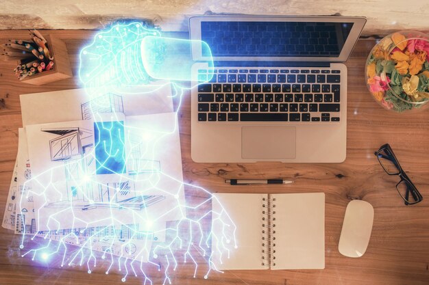 Dibujos de hologramas AR sobre la computadora en el fondo del escritorio Vista superior Concepto de exposición múltiple de realidad aumentada