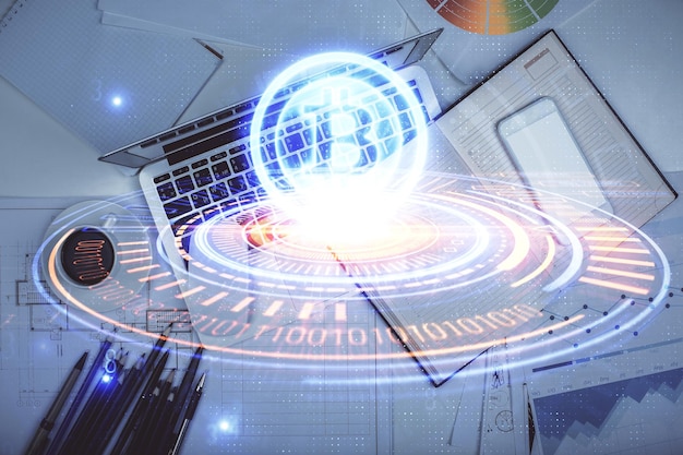 Dibujos de hologramas del tema Blockchain sobre la computadora en el fondo del escritorio Vista superior Concepto de exposición múltiple de criptoeconomía