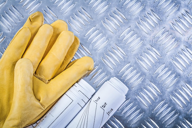 Dibujos de ingeniería guantes de cuero de seguridad en concepto de construcción de chapa estriada