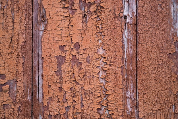 Die alte rote Holzstruktur mit natürlichen Mustern.