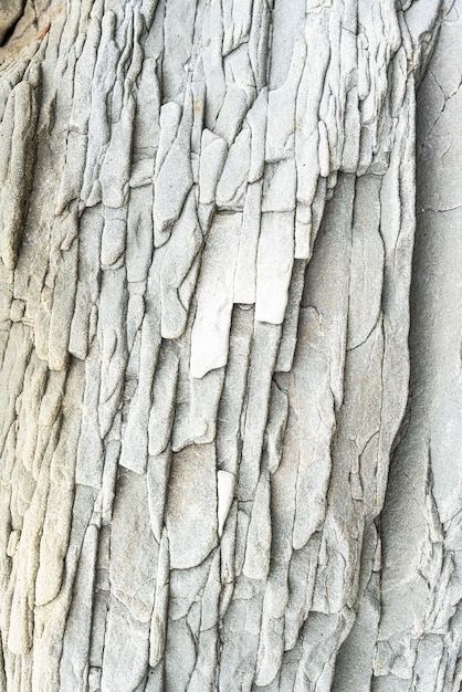 Die Felsen sind bunte Felsformationen, die sich über Hunderte von Jahren abgelagert haben Hintergrund und Textur Hochwertiges Foto