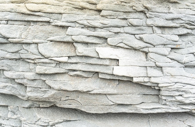 Die Felsen sind bunte Felsformationen, die sich über Hunderte von Jahren abgelagert haben Hintergrund und Textur Hochwertiges Foto