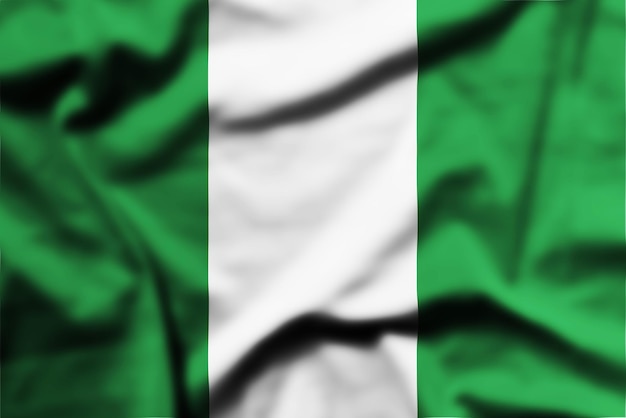 Foto die flagge nigerias schwenken