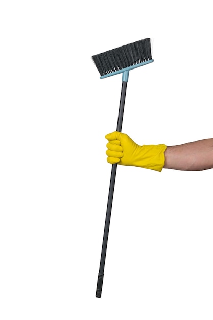 Die Hand eines Mannes in einem gelben Handschuh mit einer Reinigungsbürste isoliert auf weißem Hintergrund