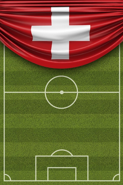 Die Landesflagge der Schweiz drapiert über einem Fußballplatz 3D-Rendering