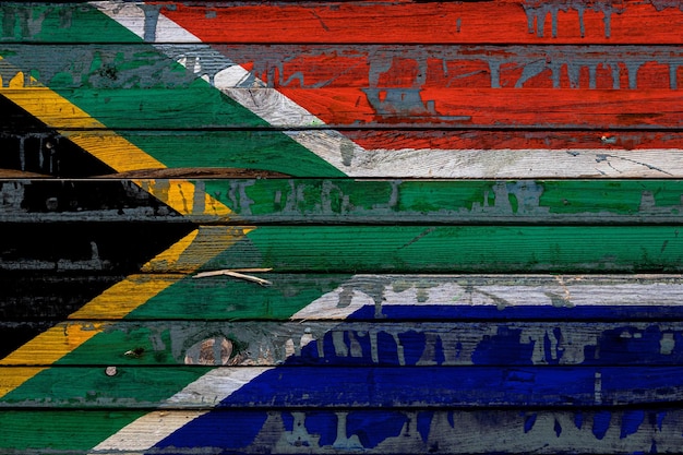 Die Nationalflagge der südafrikanischen Republik xA ist auf unebenen Brettern gemalt. Ländersymbol