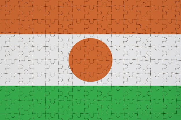 Die Niger-Flagge ist auf einem gefalteten Puzzle abgebildet