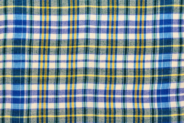 Die Textur eines Baumwollgewebes mit einem geometrischen Muster. Abstrakter Hintergrund
