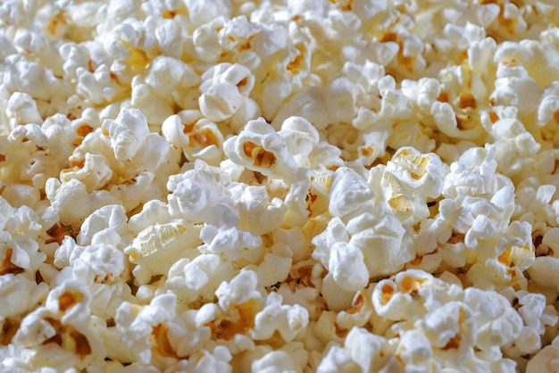 Die Textur von gesalzenem Popcorn Hintergrund