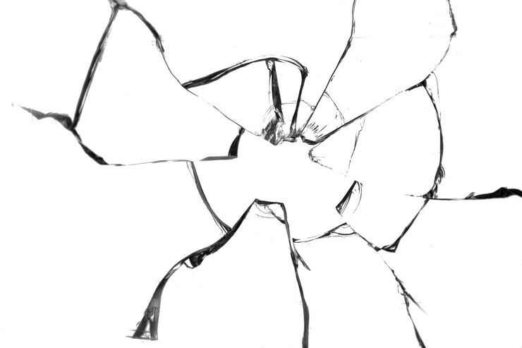 Die Textur von Glasscherben Einschussloch
