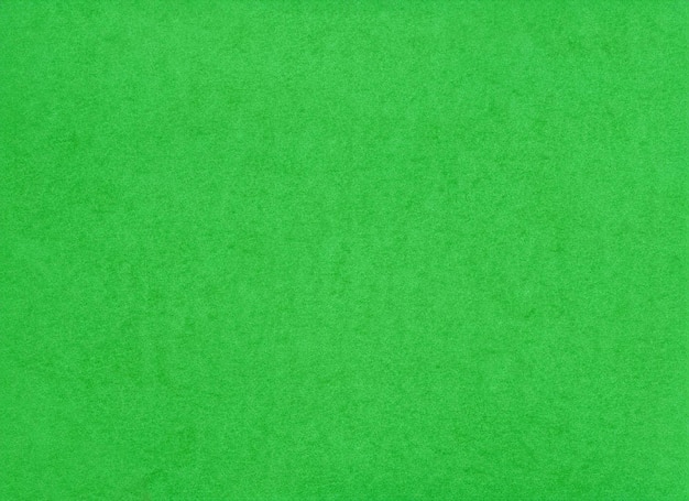 Die Textur von grünem Papier oder Hintergrund