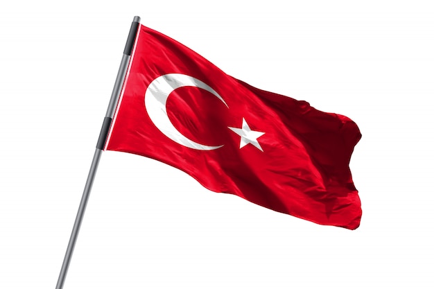 Foto die türkei-flagge, die gegen weißes hintergrundvorratbild wellenartig bewegt