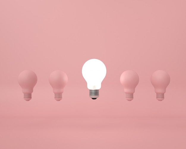 Diferença lâmpada em rosa. conceito de idéia criativa mínima.