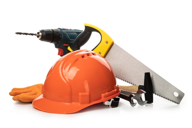 Foto diferentes accesorios de construcción aislados en blanco