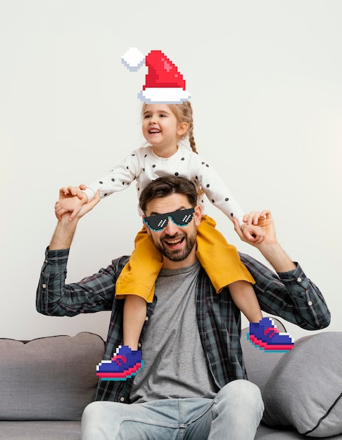 Foto digitaler pixelkunsteffekt von vater und tochter mit weihnachtsmütze