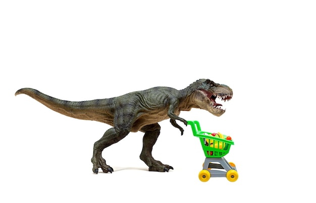 Un dinosaurio Tyrannosaurus de juguete con un carrito de supermercado