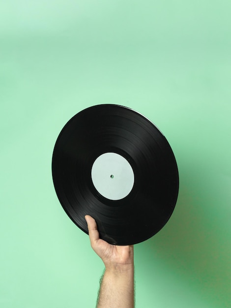 Disco de vinil de mão