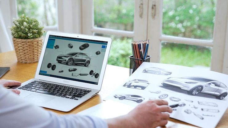 Foto diseñador de automóviles analizando cuidadosamente el prototipo de automóvil synchronos