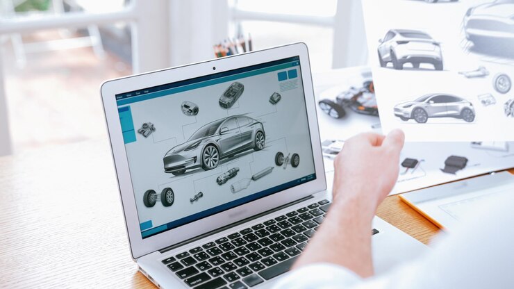 Foto diseñador de automóviles analizando cuidadosamente el prototipo de automóvil synchronos