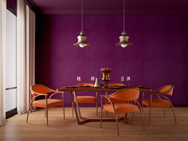 Diseño de comedor con sillón naranja, lámpara, lámpara y piso de madera.