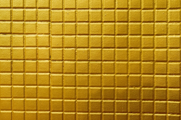 Foto el diseño de estuco de oro de estilo tailandés nativo en la pared