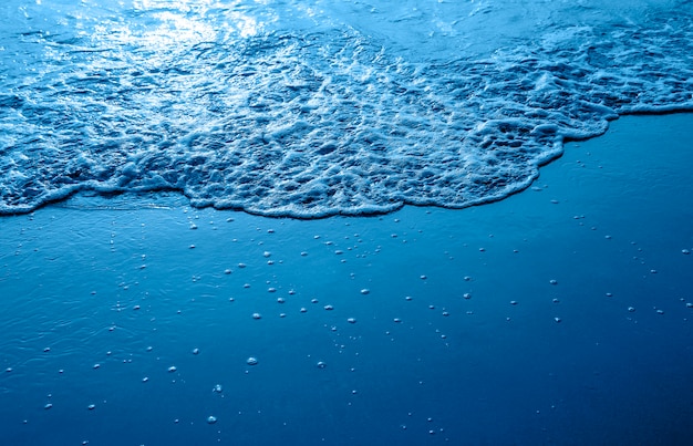 Diseño de fondo de verano de playa azul con onda suave