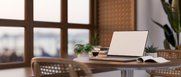 Diseño de interiores de cafetería escandinava mínima con una computadora portátil en una mesa de madera con renderizado 3d