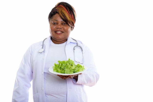 Foto disparo de estudio de doctora feliz