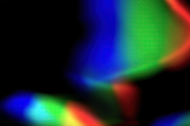 Foto dispersão de luz de prisma de cristal rgb em fundo preto