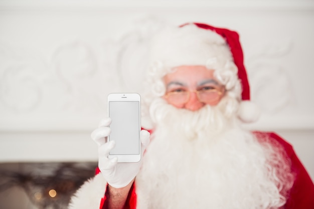 Foto divertido, santa claus, con, anteojos, y, un, teléfono