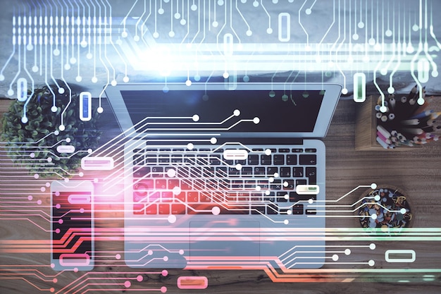 Doble exposición del boceto del holograma de datos sobre el fondo de la mesa de estudio con el concepto de computadora de la vista superior de Ai