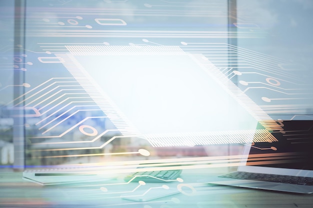 Doble exposición de computadora de escritorio y holograma temático de tecnología Concepto de desarrollo de software