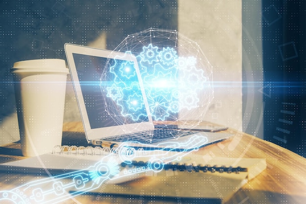 Doble exposición de computadora de escritorio y holograma temático de tecnología Concepto de desarrollo de software